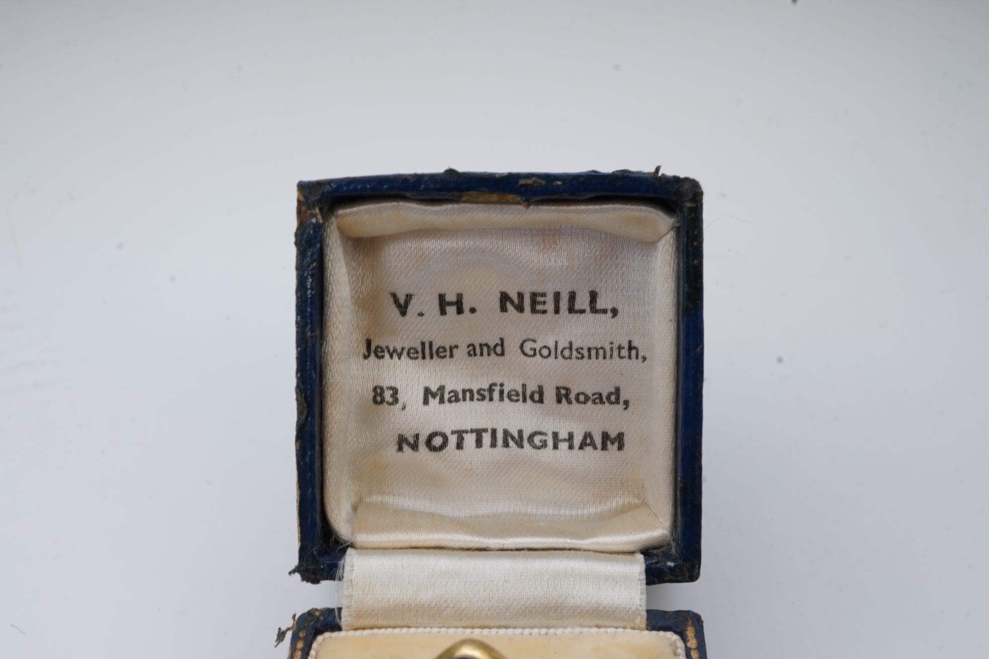 An unusual garnet locket ring, late 19th century composite